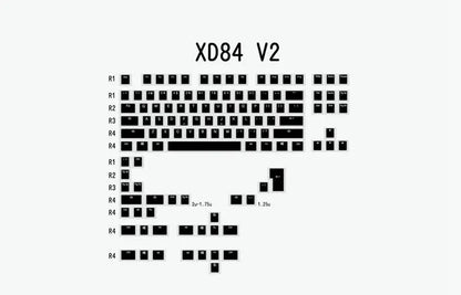 Pudding V2 doubleshot PBT mechanical keyboard keycaps with white/black retro colourway and translucent legends for backlit keyboards
