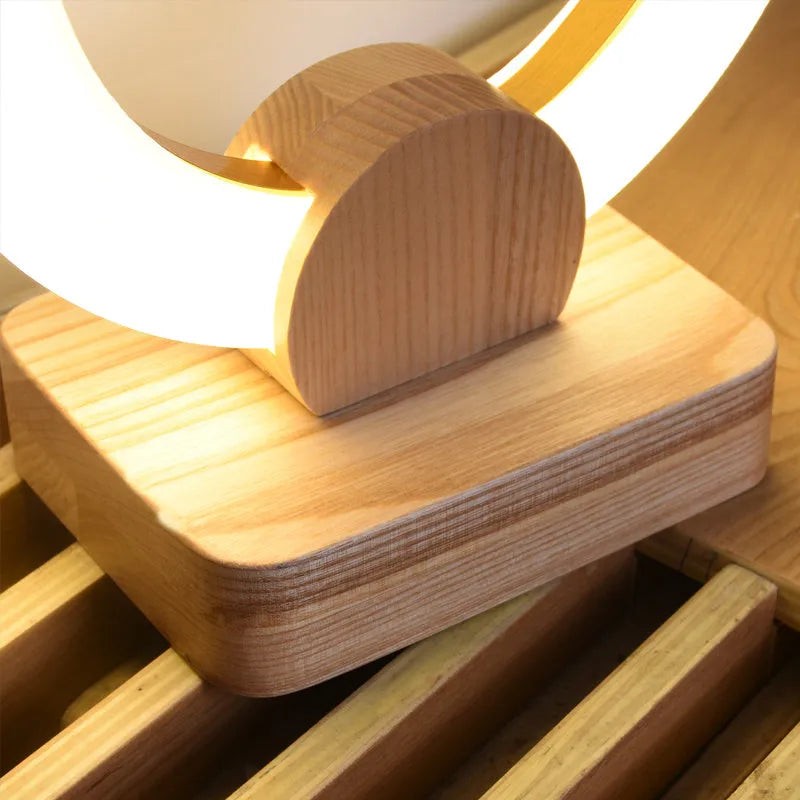 Wooden circular chandelier for modern living room or dining room lighting, featuring Nordic art design with a 20cm or 30cm diameter acrylic shade and button switch for LED light.