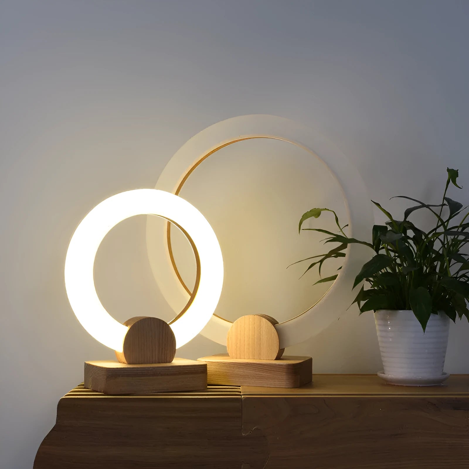 Wooden circular Nordic style chandelier with acrylic shade, shown in 20cm and 30cm diameter options.