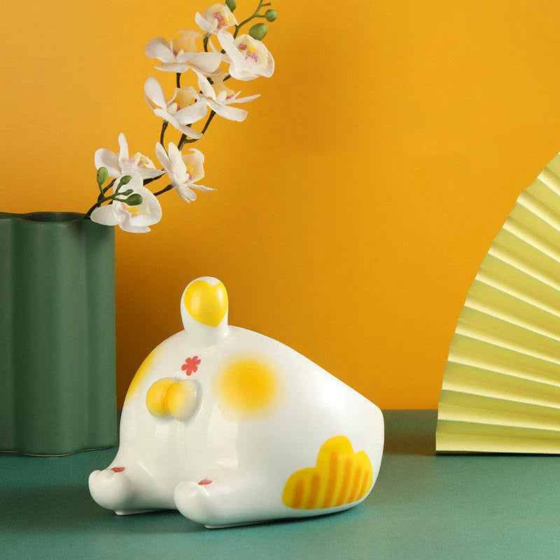Stylish ceramic pet bowls in various cat-inspired designs, featuring inclined mouths for comfortable eating and large capacities for food and water.