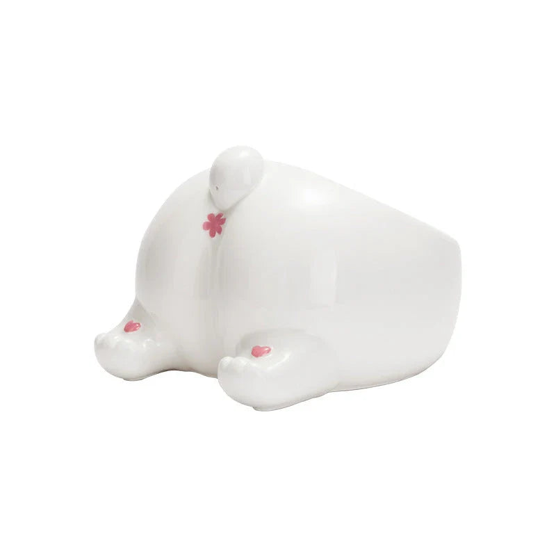 Stylish ceramic pet bowls in various cat-inspired designs, featuring inclined mouths for comfortable eating and large capacities for food and water.