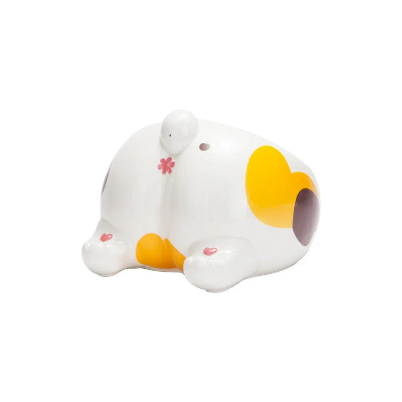 Stylish ceramic pet bowls in various cat-inspired designs, featuring inclined mouths for comfortable eating and large capacities for food and water.