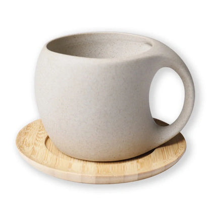 Elegant Ceramic Cold Brew Kettle Set with matching cups on bamboo tray
