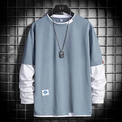 Long sleeve round neck top in black, blue, dark grey or white, loose fit plain design for autumn layering