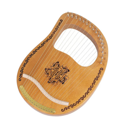 Small mahogany harp measuring 37cm wide with original wood colour and included tuning accessories