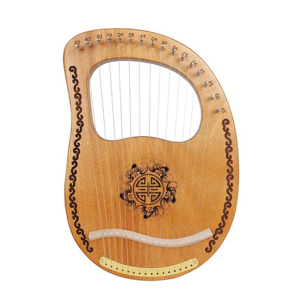 Small mahogany harp measuring 37cm wide with original wood colour and included tuning accessories