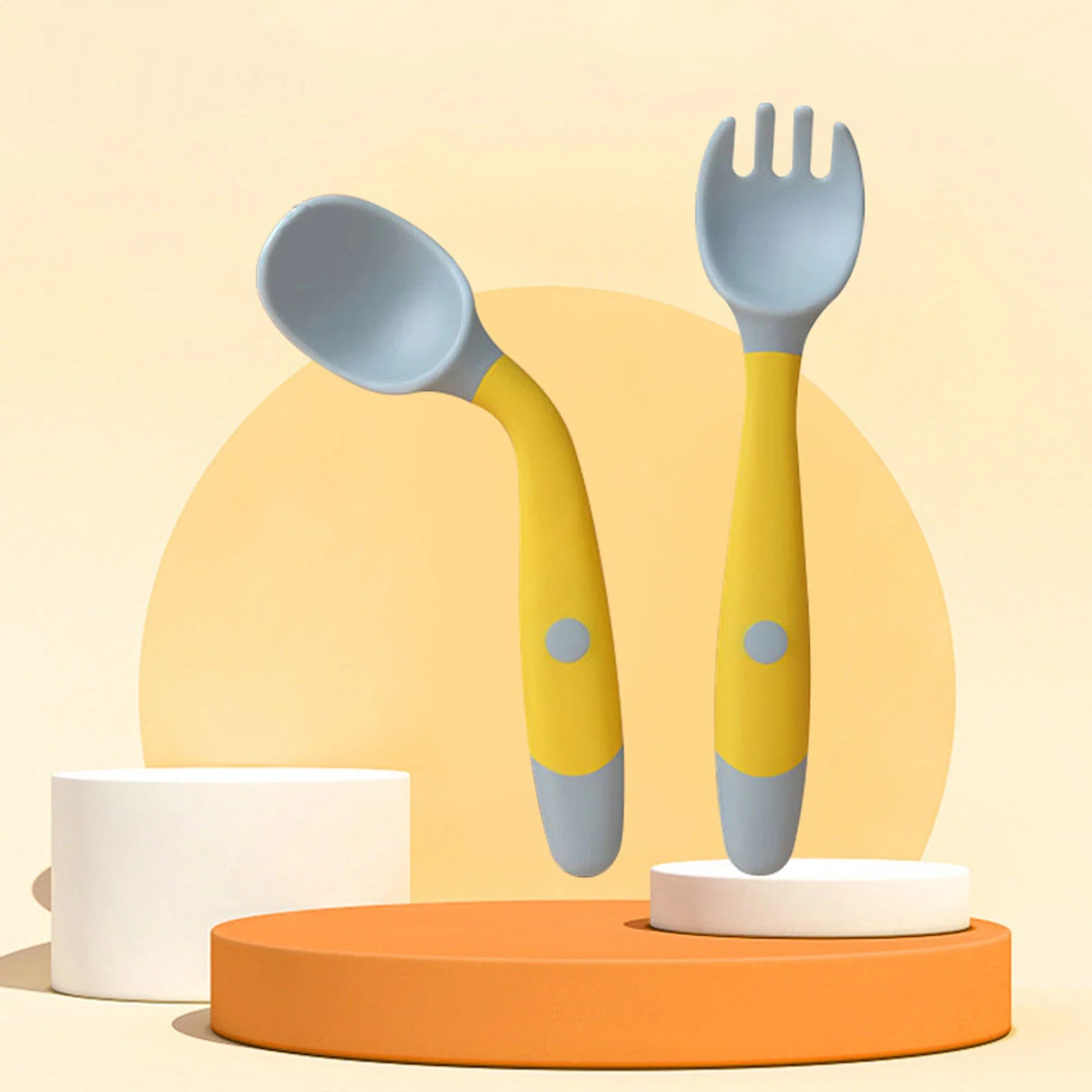 Flexible silicone baby spoon and fork set with ergonomic design for toddlers to learn self-feeding comfortably
