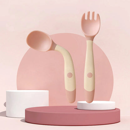 Flexible silicone baby spoon and fork set with ergonomic design for toddlers to learn self-feeding comfortably