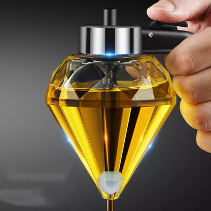 Diamond-shaped glass oil jug with press-type dispenser for drip-free pouring