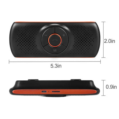 Orange Bluetooth car hands-free speaker mounted on vehicle sun visor for wireless phone calls and music