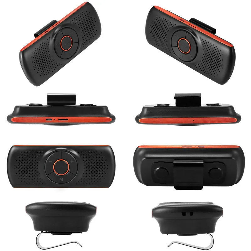 Orange Bluetooth car hands-free speaker mounted on vehicle sun visor for wireless phone calls and music