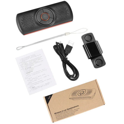 Orange Bluetooth car hands-free speaker mounted on vehicle sun visor for wireless phone calls and music