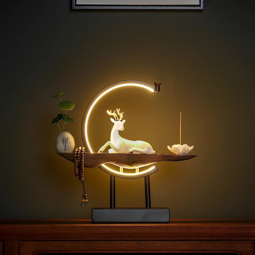 White ceramic deer sculpture with integrated light ring and USB cable for living room decoration