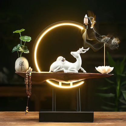 White ceramic deer sculpture with integrated light ring and USB cable for living room decoration