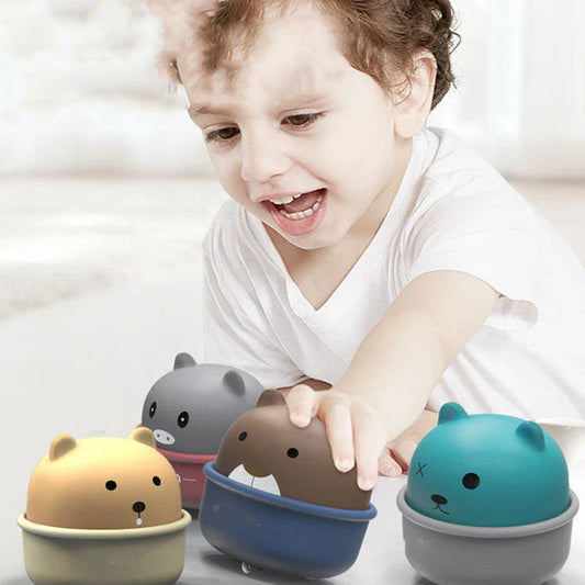 Colorful cartoon animal-themed wind-up toy cars in various colors, perfect for toddlers and young children's playtime