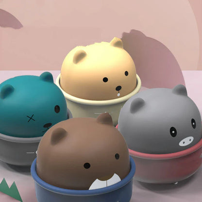 Colorful cartoon animal-themed wind-up toy cars in various colors, perfect for toddlers and young children's playtime