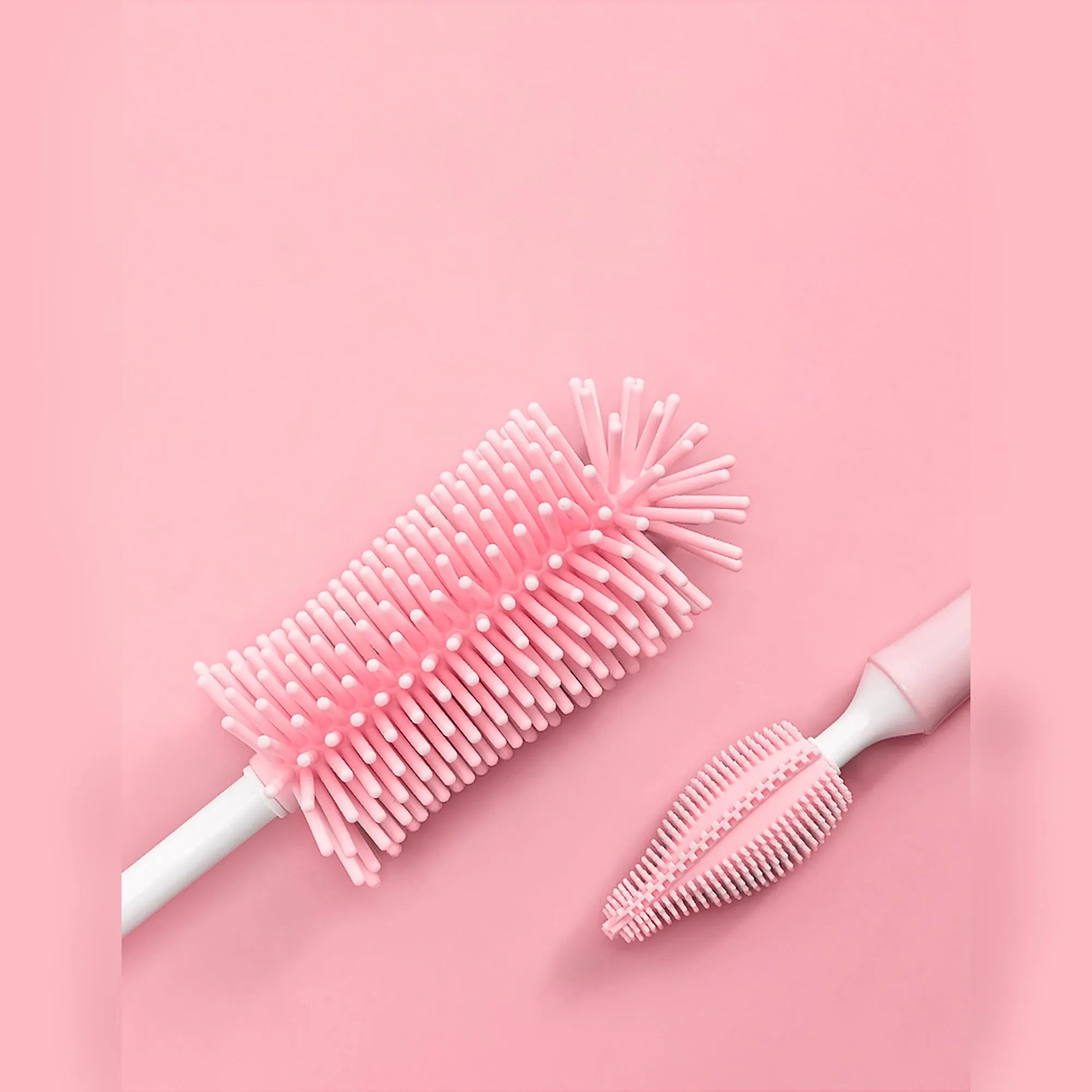 Silicone baby bottle brush with flexible handle and straw cleaning attachment in multiple colour options