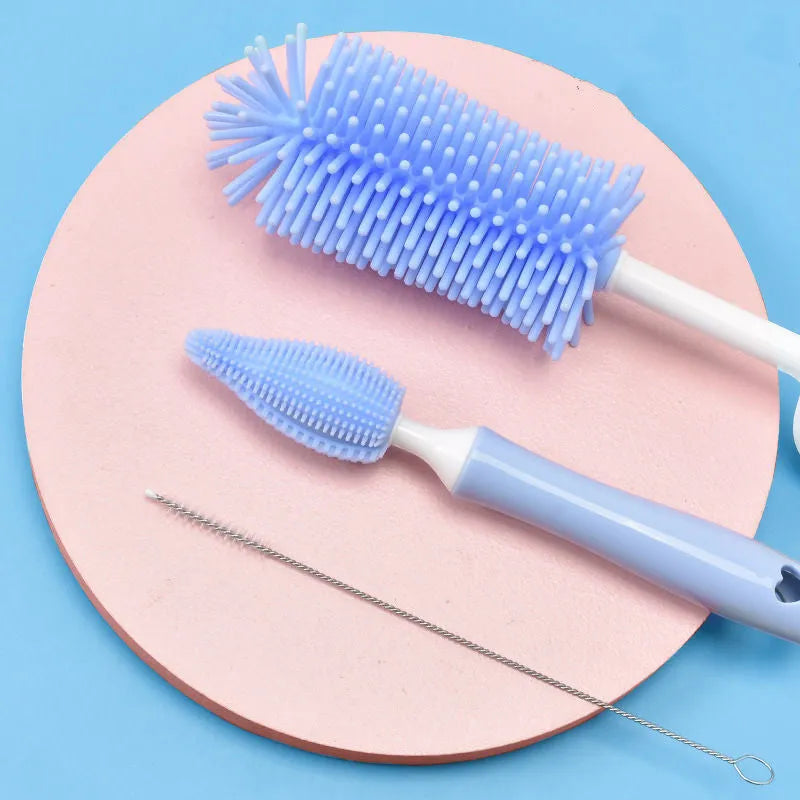 Silicone baby bottle brush with flexible handle and straw cleaning attachment in multiple colour options