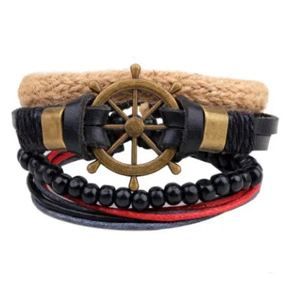 Hand-woven brown leather bracelet with wooden beads and rope detailing on a wrist.