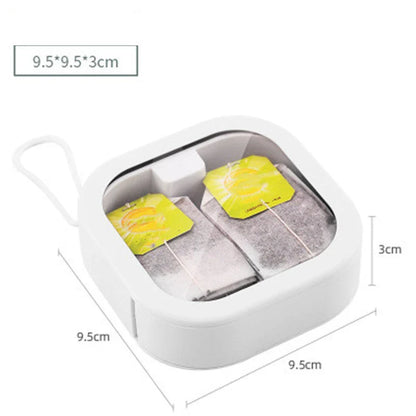 Portable push-button storage box in white color, featuring a sleek and modern design for desk or travel organization