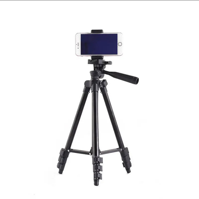 Black aluminium camera tripod with 3D head extended to maximum height with quick release plate