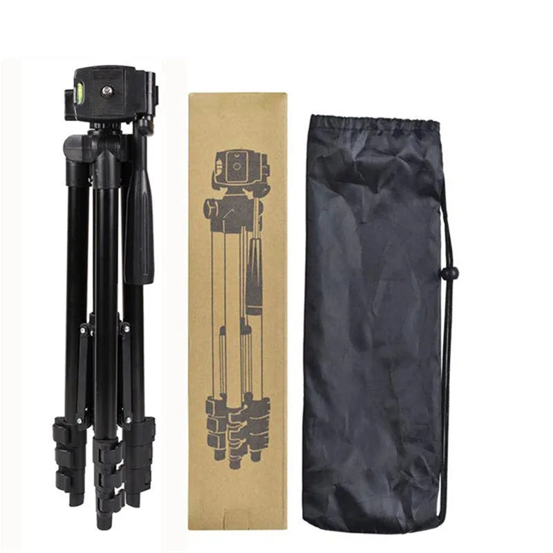 Black aluminium camera tripod with 3D head extended to maximum height with quick release plate