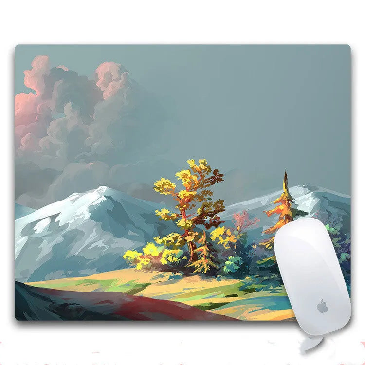 Custom mouse pad with selected graphic on fabric surface and non-slip rubber base.