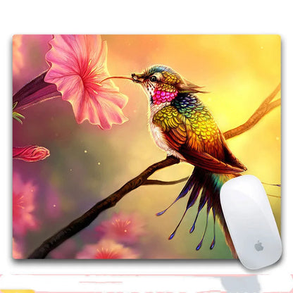 Custom mouse pad with selected graphic on fabric surface and non-slip rubber base.