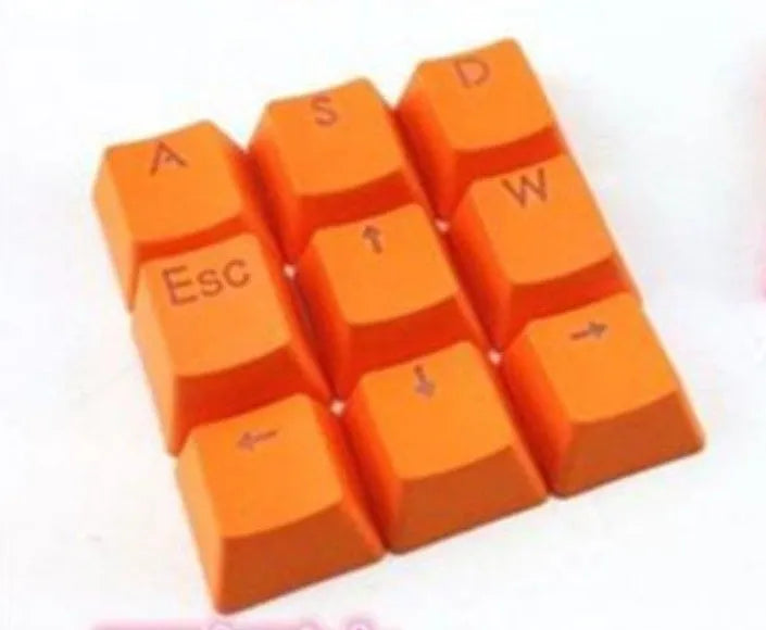 Set di 12 keycaps Redragon PBT metallici rossi per tastiere meccaniche con caratteri a doppia iniezione