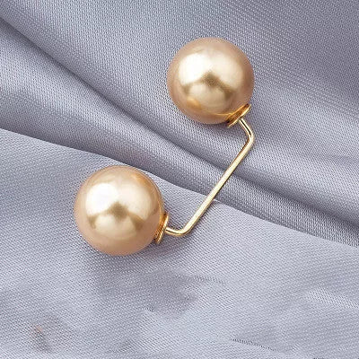 Copper bow tie brooch with pearl detail for skirt waist