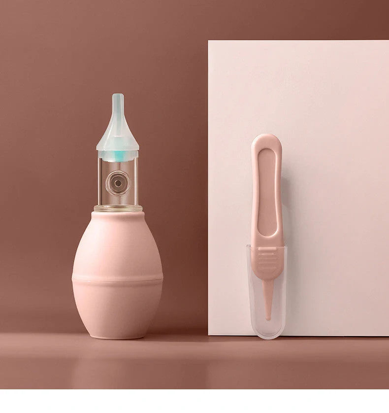 Infant Silicone Nasal Aspirator in pink and green for effective mucus removal