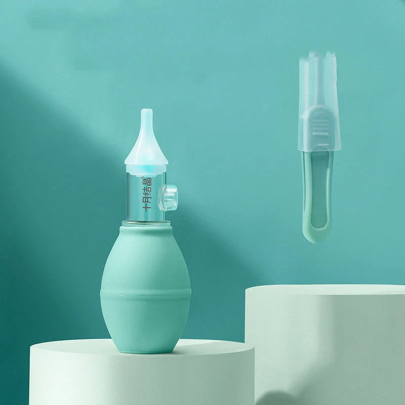 Infant Silicone Nasal Aspirator in pink and green for effective mucus removal