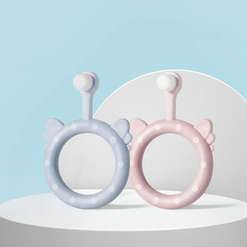 Infant children's soft silicone toothbrush set in blue, pink, and green for safe gum care