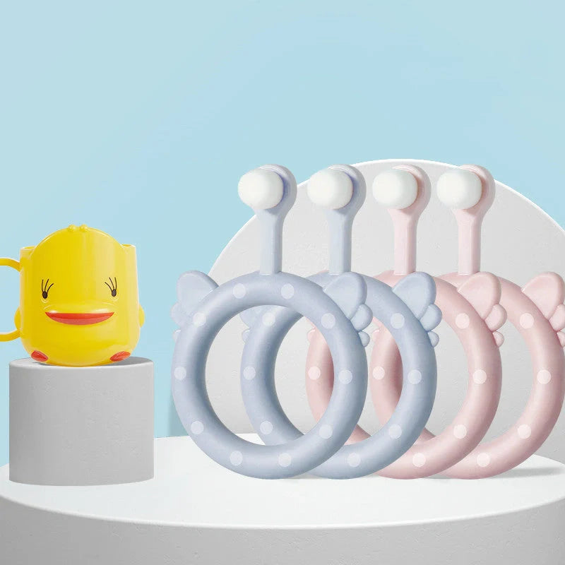 Infant children's soft silicone toothbrush set in blue, pink, and green for safe gum care