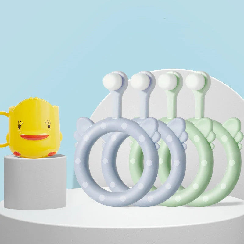 Infant children's soft silicone toothbrush set in blue, pink, and green for safe gum care