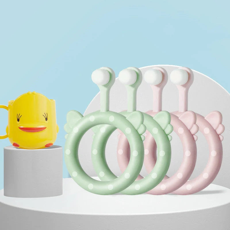 Infant children's soft silicone toothbrush set in blue, pink, and green for safe gum care