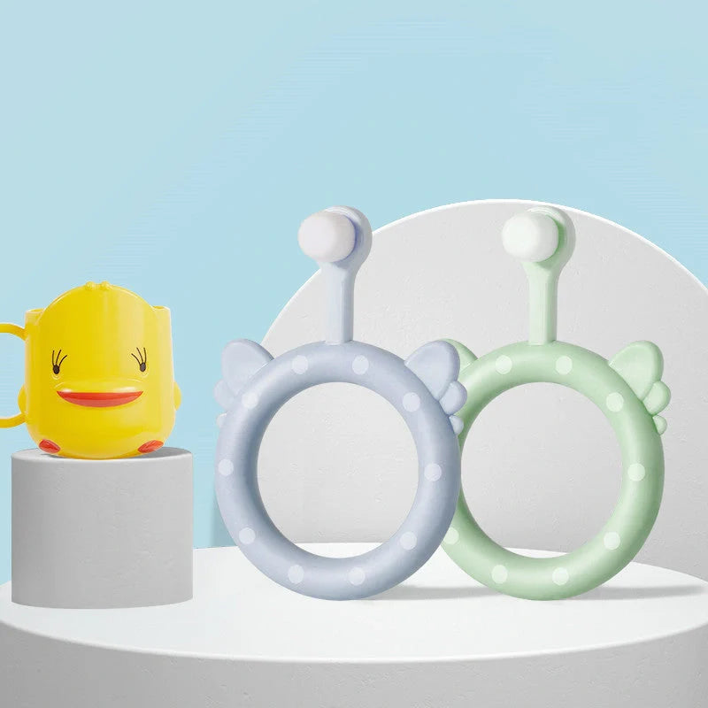 Infant children's soft silicone toothbrush set in blue, pink, and green for safe gum care