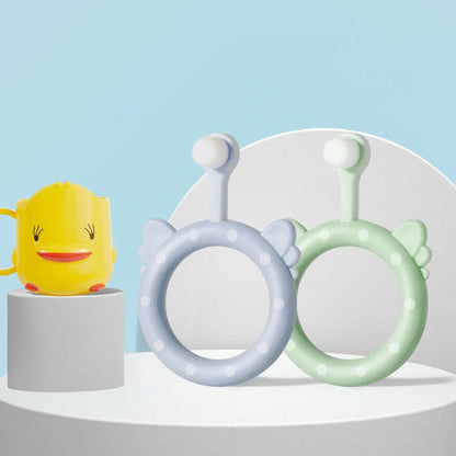 Infant children's soft silicone toothbrush set in blue, pink, and green for safe gum care