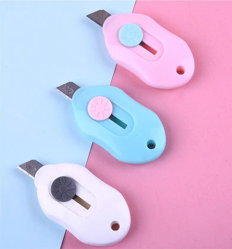Art knife plastic and metal craft cutting tool with cartoon design manual production implement suitable for detailed craft work available in five character styles including Miffy 3, Mini circle 1, Mini circle 3, Mini length 3 and Robot 3