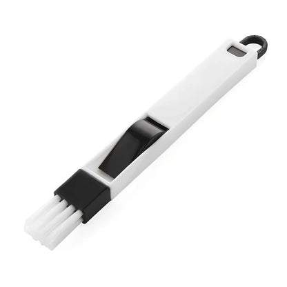 Black cleaning brush with 18.5cm handle and 2cm brush head for window slots and keyboard gaps