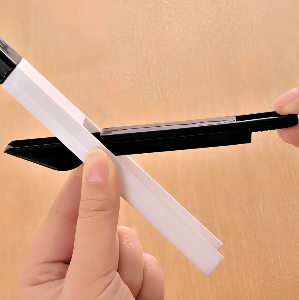 Black cleaning brush with 18.5cm handle and 2cm brush head for window slots and keyboard gaps