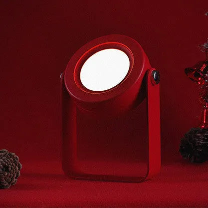 White foldable USB rechargeable LED night light in both table lamp and tall lantern modes.
