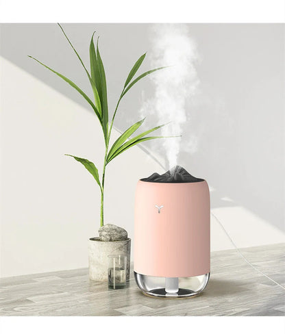 Magic Flame Humidifier in white, light blue, and pink - compact ultrasonic aroma diffuser for small spaces
