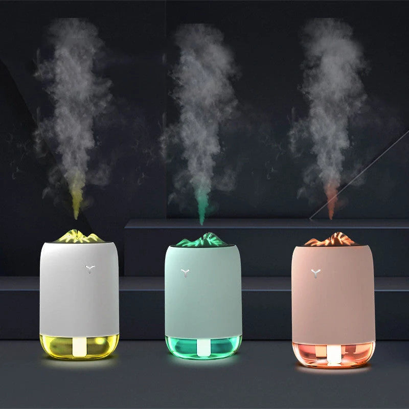 Magic Flame Humidifier in white, light blue, and pink - compact ultrasonic aroma diffuser for small spaces