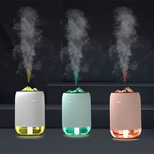 Magic Flame Humidifier in white, light blue, and pink - compact ultrasonic aroma diffuser for small spaces
