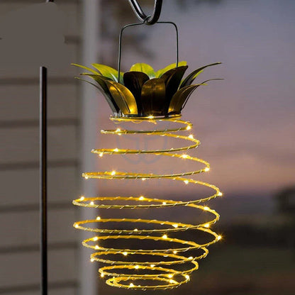Elegant solar-powered pineapple-shaped garden lights with warm white LED illumination