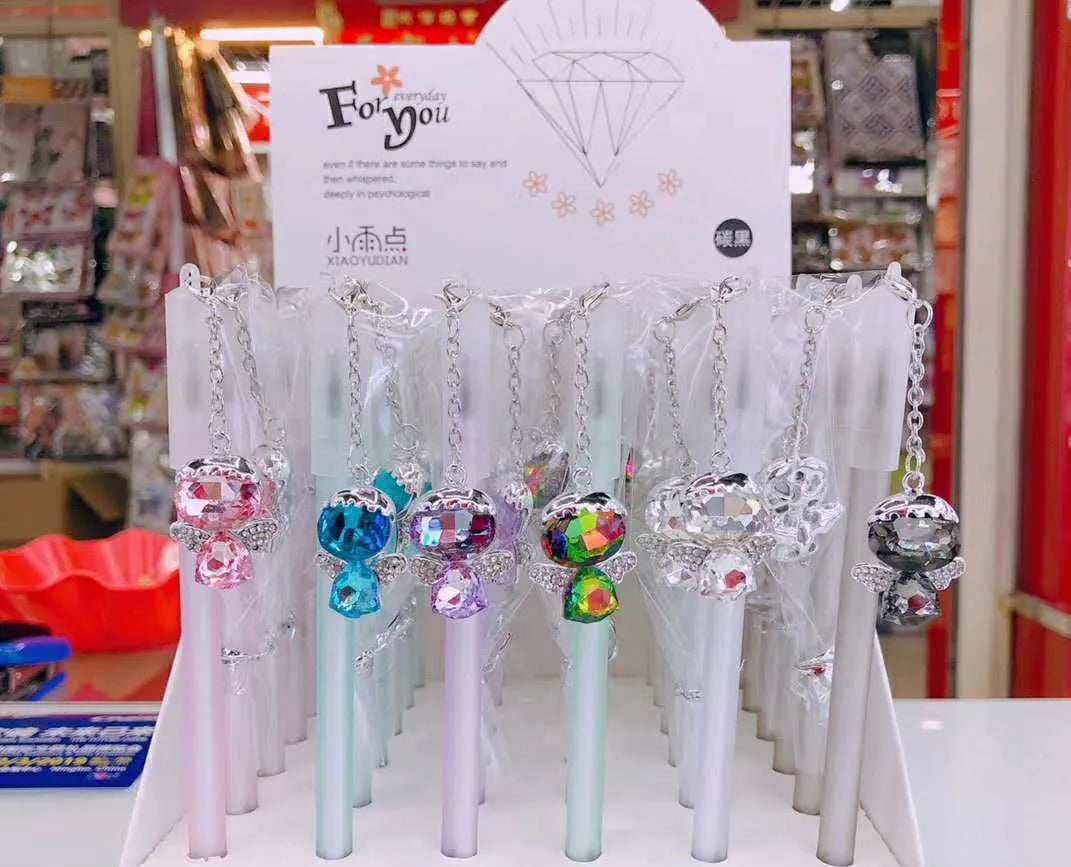 Little Angel Girl Water Pendant Gel Pen showing 15cm plastic body and decorative pendant.