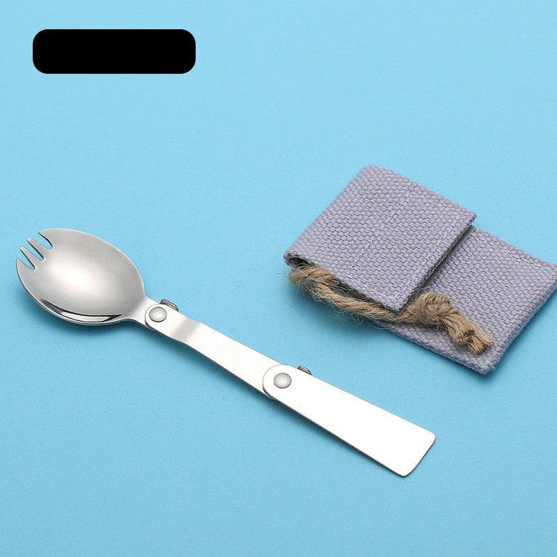 Compact titanium folding spoon with a canvas carrying case, perfect for outdoor dining and camping adventures