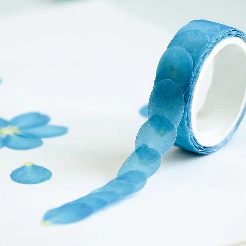 Roll of clover and paper decorative craft tape in blue, cherry blossom, mixed colour, and violet options.
