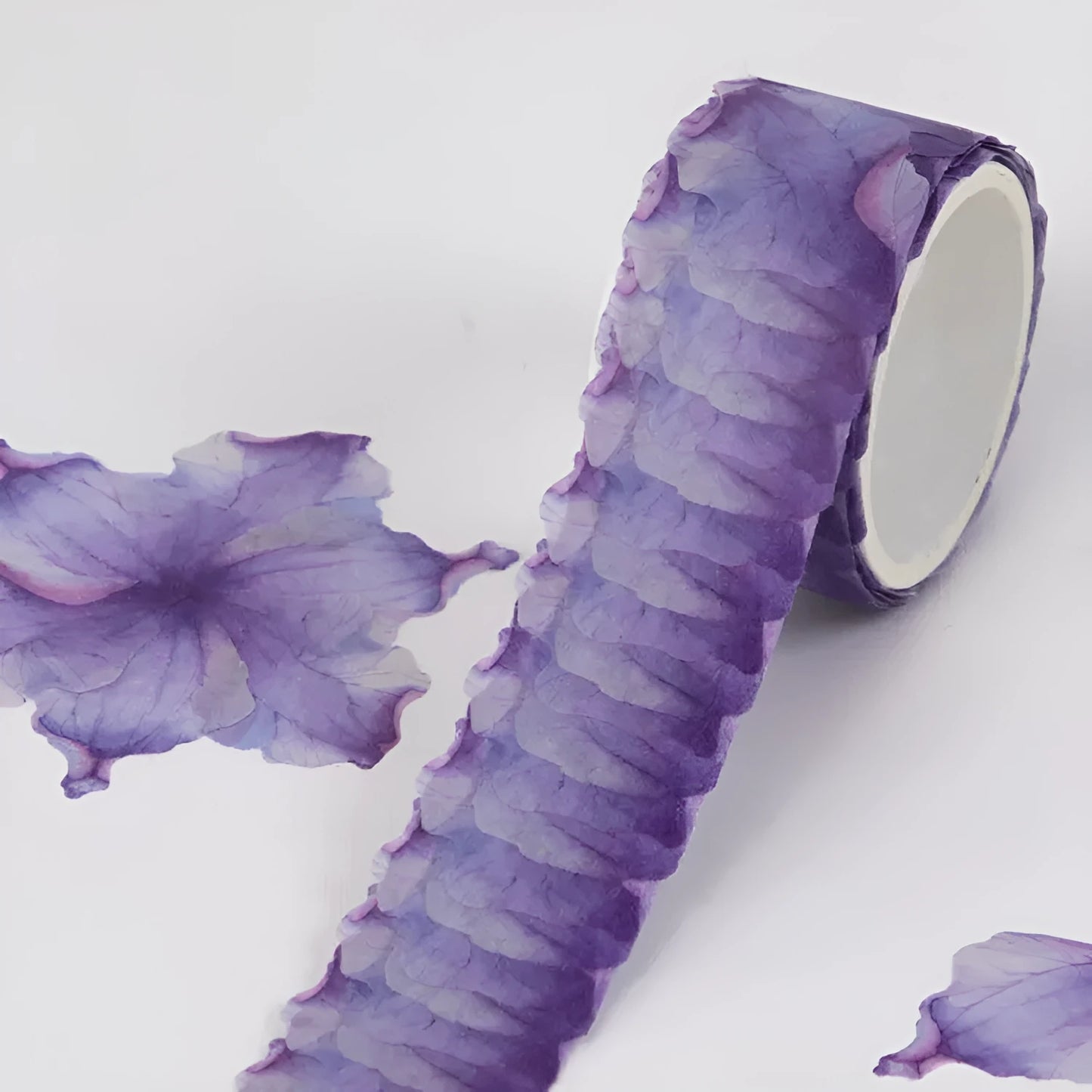 Roll of clover and paper decorative craft tape in blue, cherry blossom, mixed colour, and violet options.